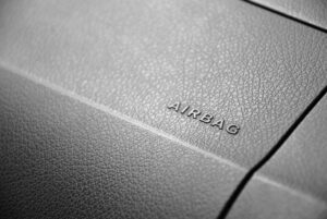 Mitsubishi airbag control unit class action settlement