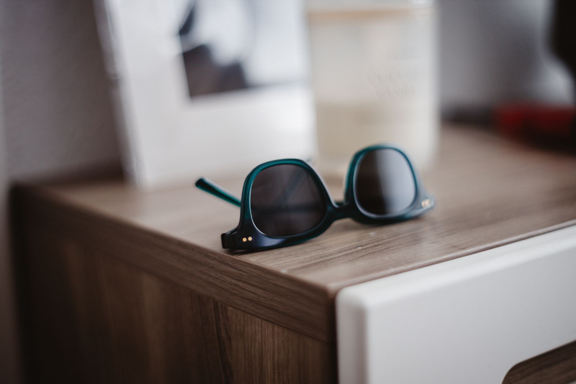 sunglasses on wooden table