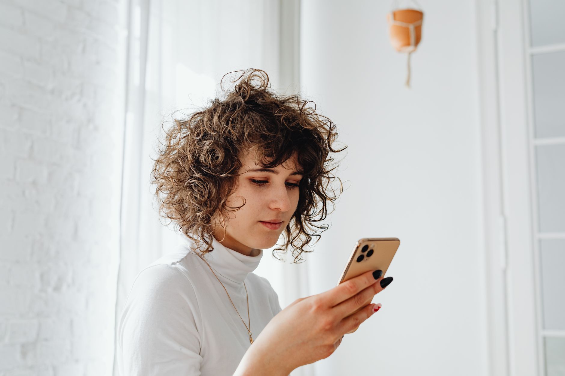 Person reading a text message on a phone, illustrating the CVS ExtraCare TCPA text class action