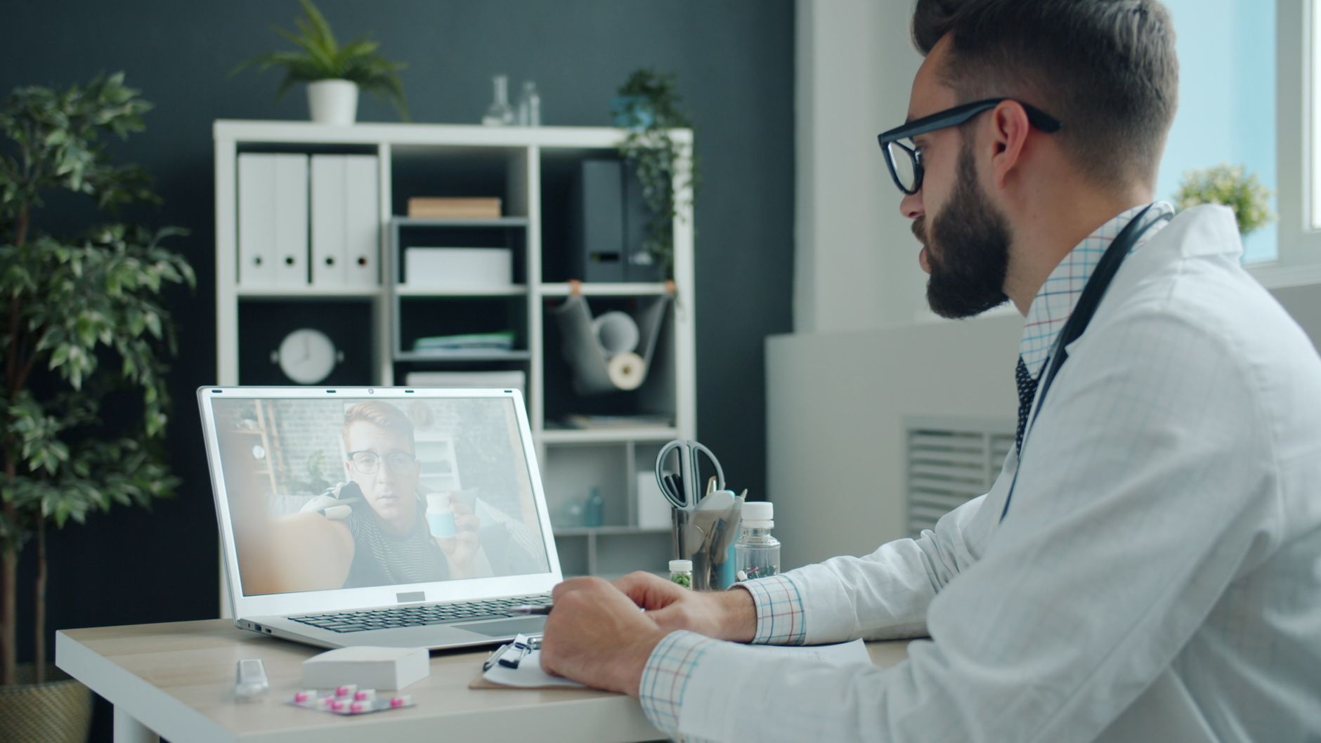 Patient on a telehealth video visit, illustrating the FTC case against Hims & Hers