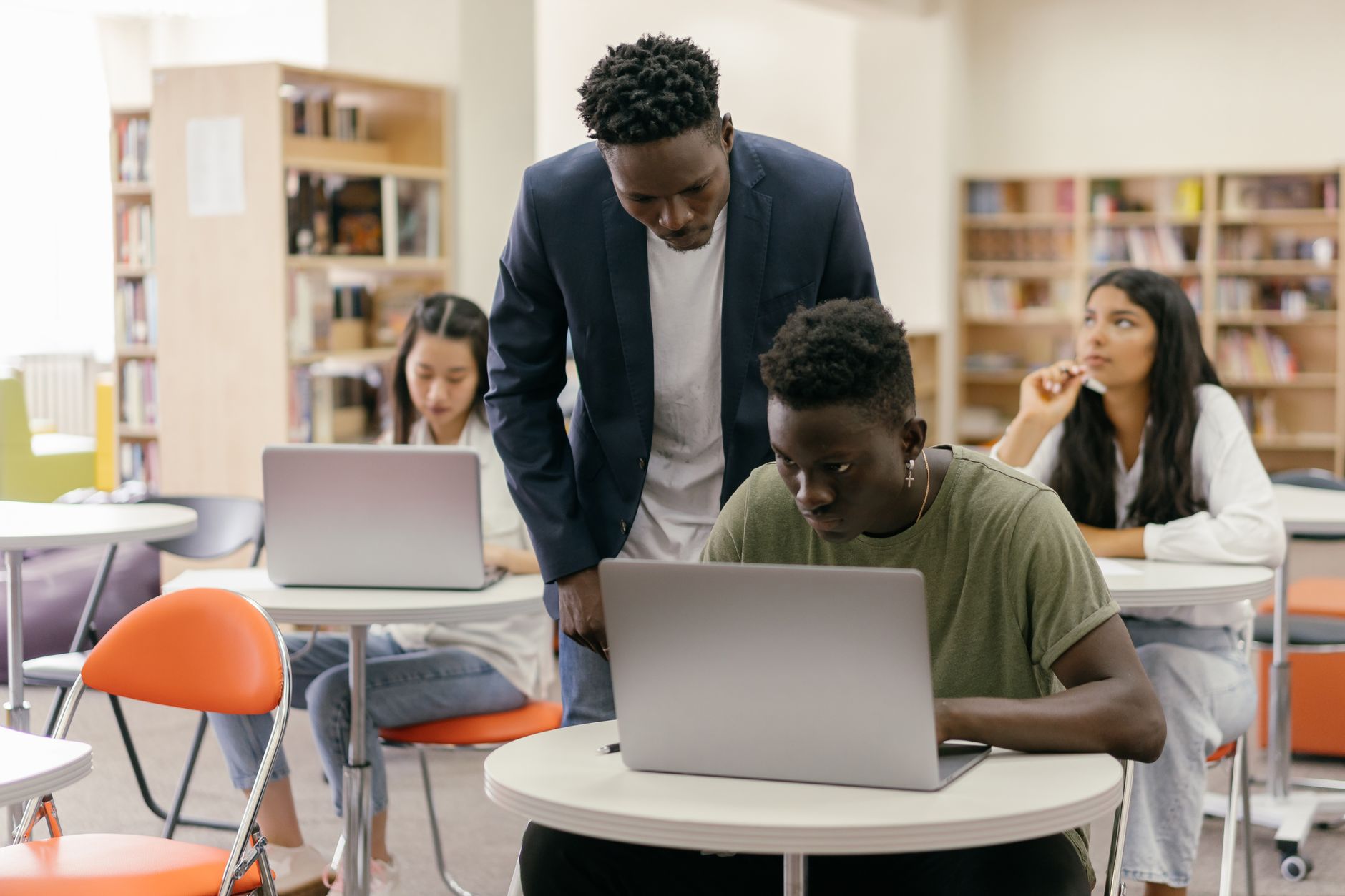 Students using laptops in a classroom, illustrating the Microsoft Washington student data class action